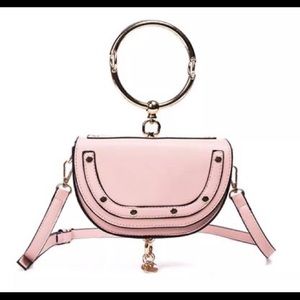 Brand new women pink cross handbag